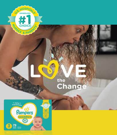 Mom changing baby's diaper for how to save on pampers diapers at Food City